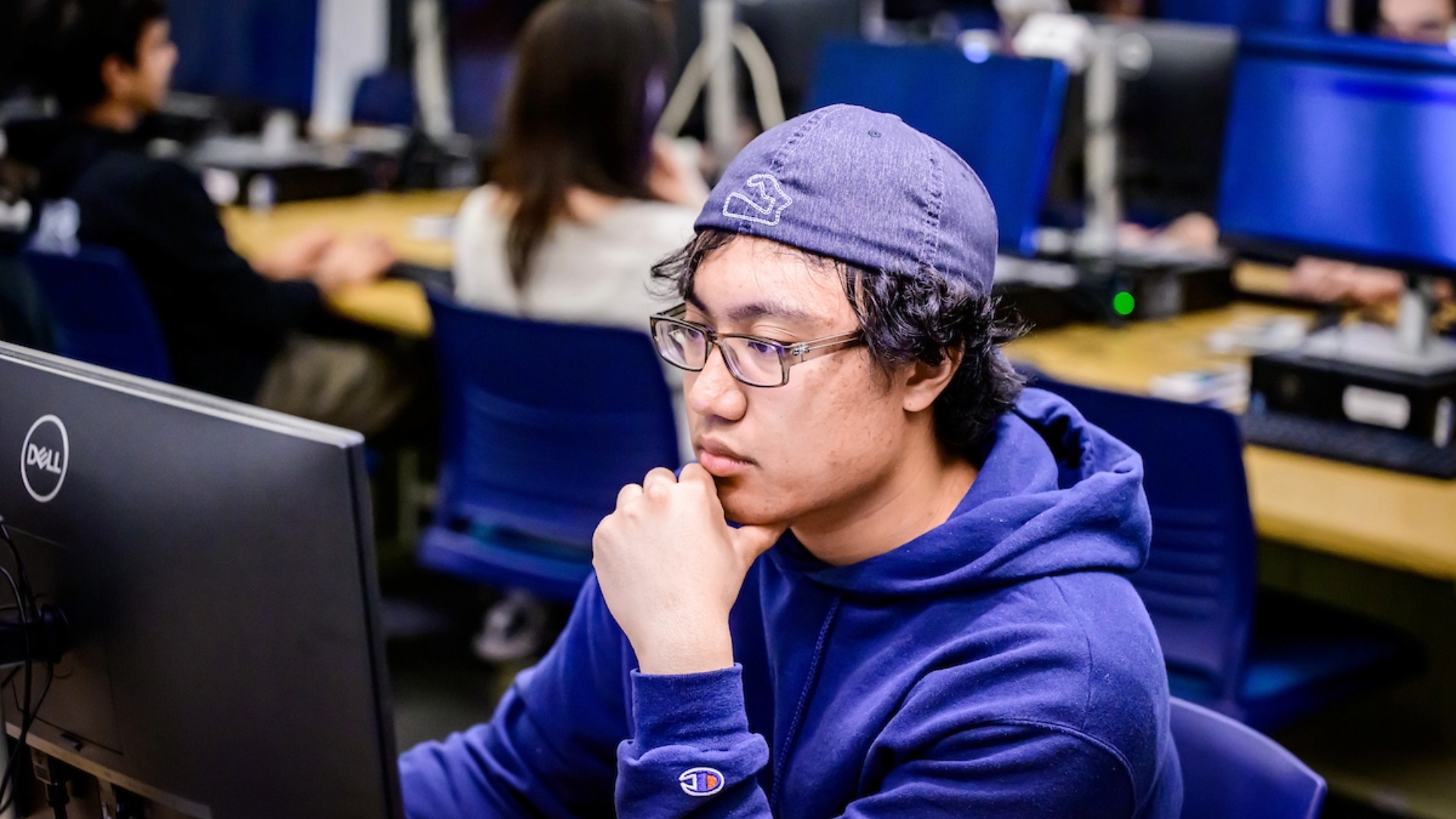 Student working on a computer in a lab